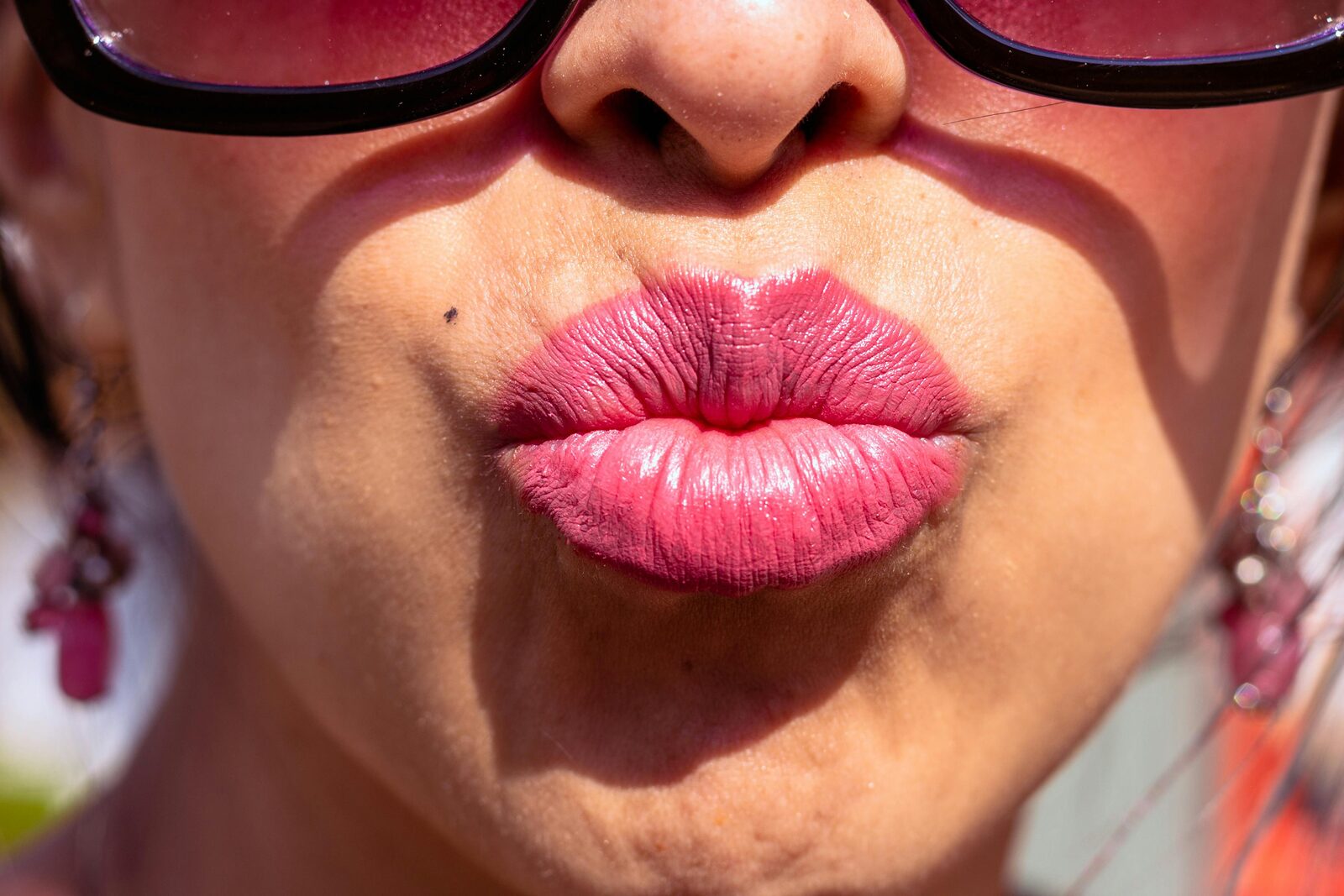 Close-up of glossy lips with visible texture